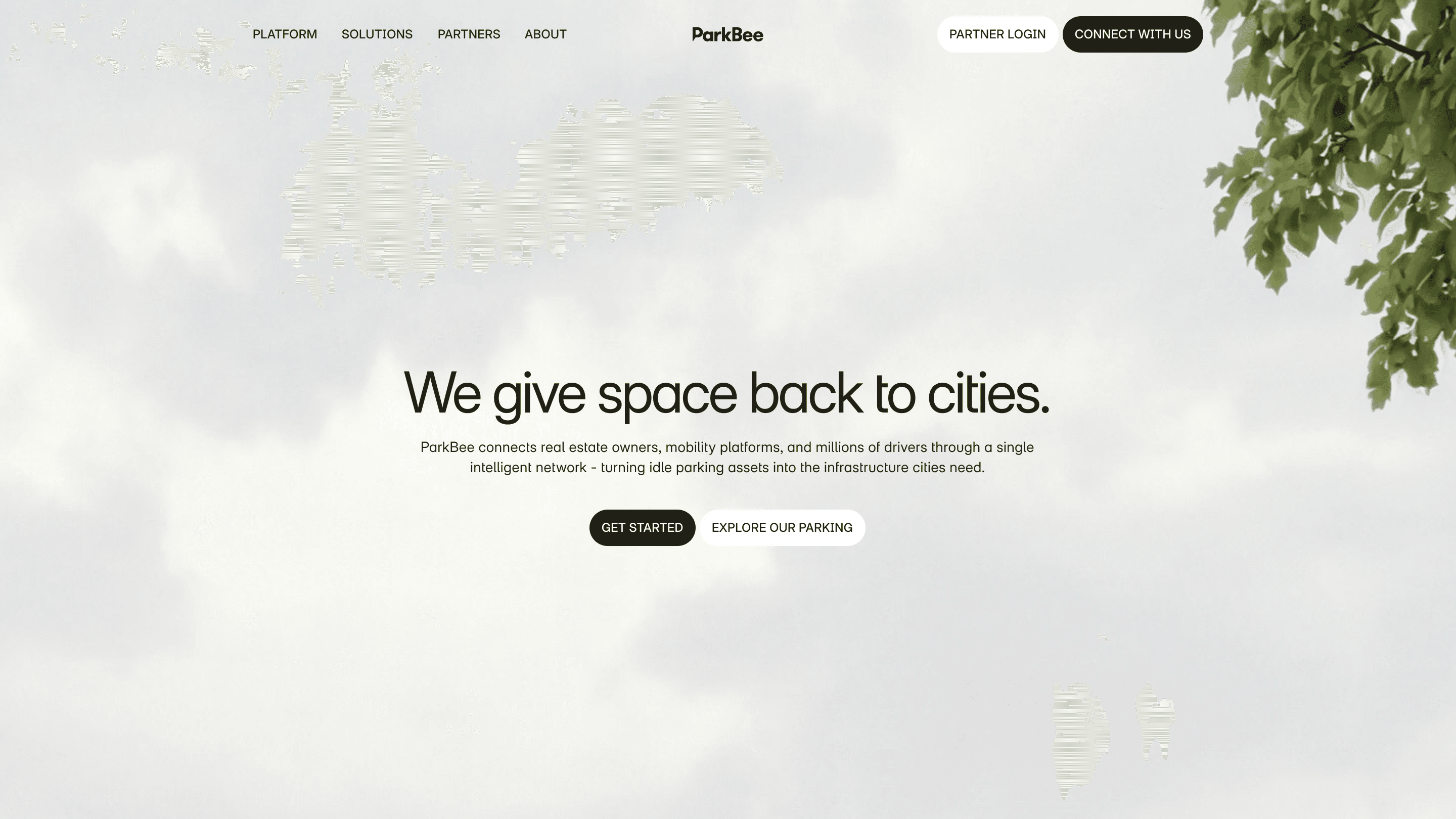 First homepage direction: We give space back to cities in a warm cream layout with a tree in the corner