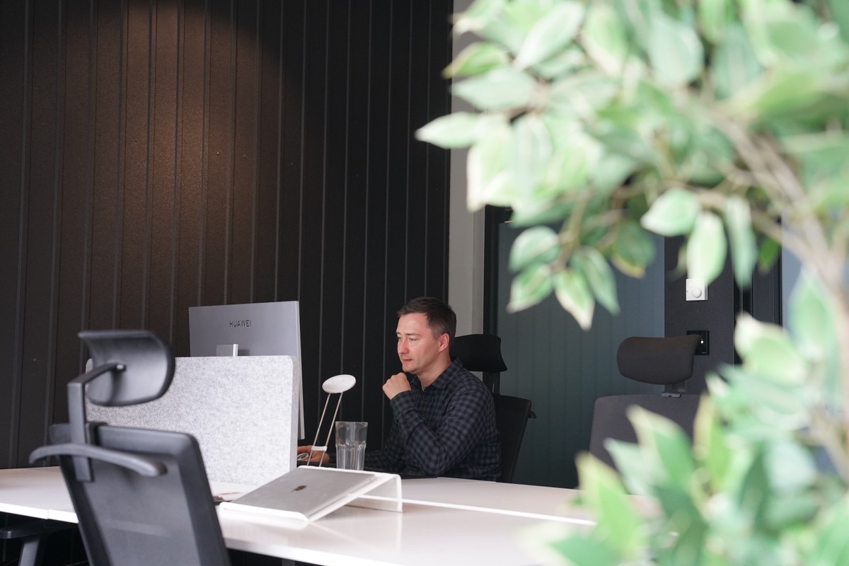 Working at a desk in the studio